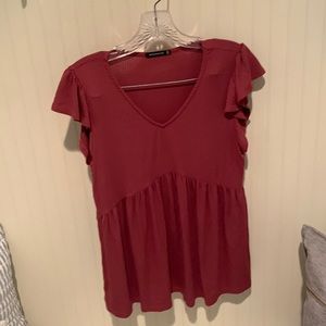 Babydoll rose colored knit top. Size small.